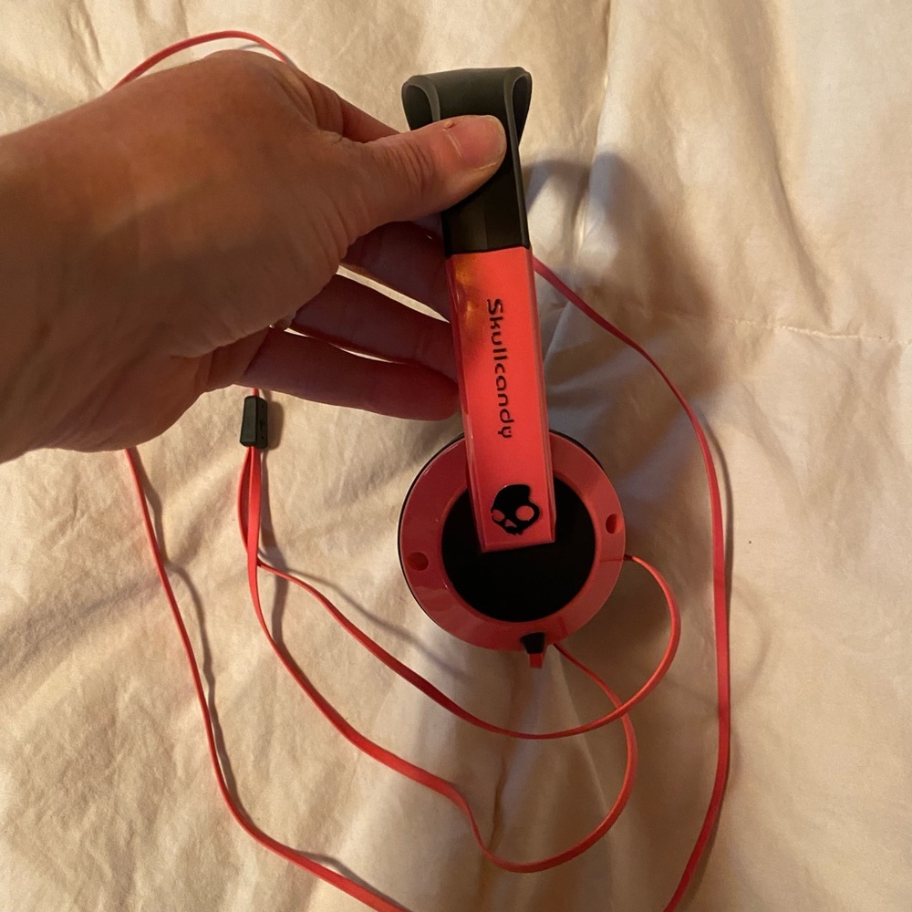 Skullcandy headphones. Pink and black